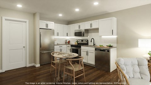 a kitchen with white cabinets and stainless steel appliances and a table at Casa Marti, Florida, 33605